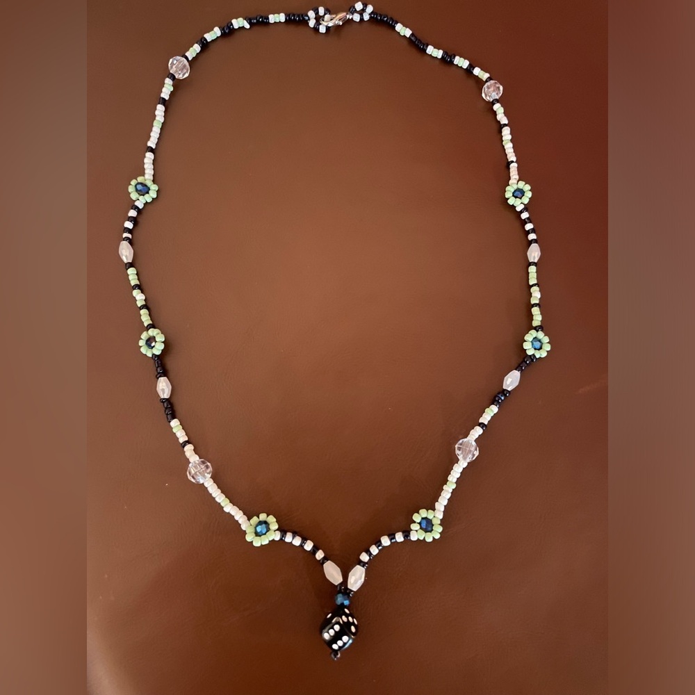Necklace, glass beading. Swarovski crystal beads. Black, white, mint green.